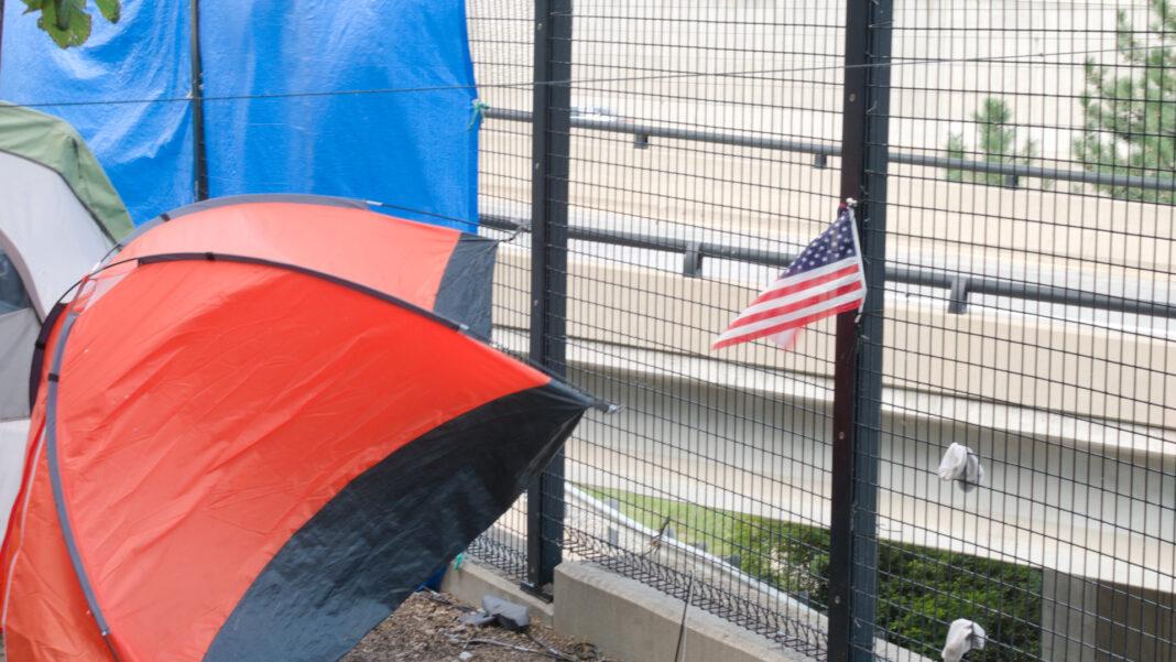 P1210377 Tent of Homeless person with American flag